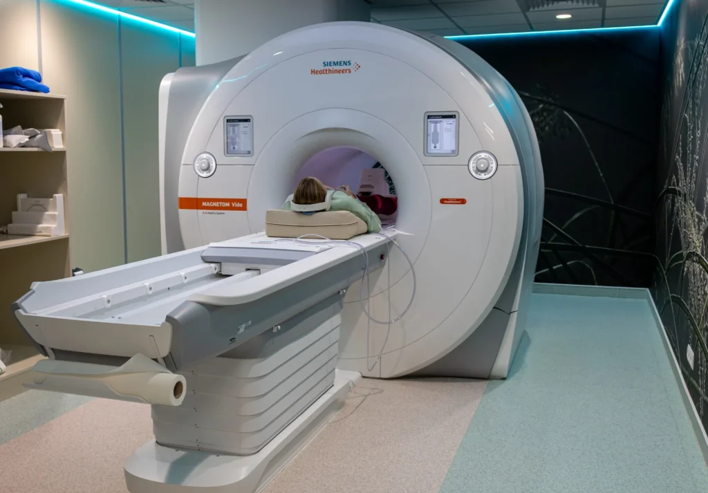 Patient being scanned on a 3T Siemens Magnetom Vida MRI at SAGENA in Frýdek-Místek.
